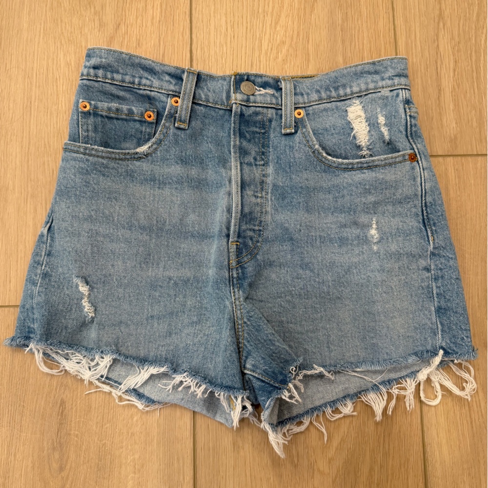 Levi’s ribcage straight Light Blue Distressed Denim Shorts